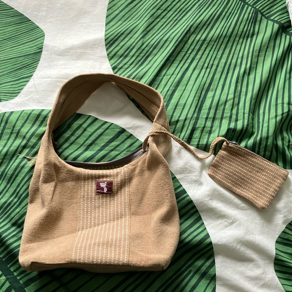 Fun and cute roomy summer hobo bag! With attached cute change purse.